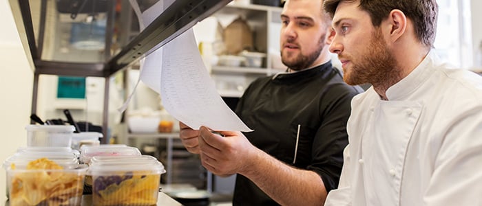 staff members taking kitchen inventory
