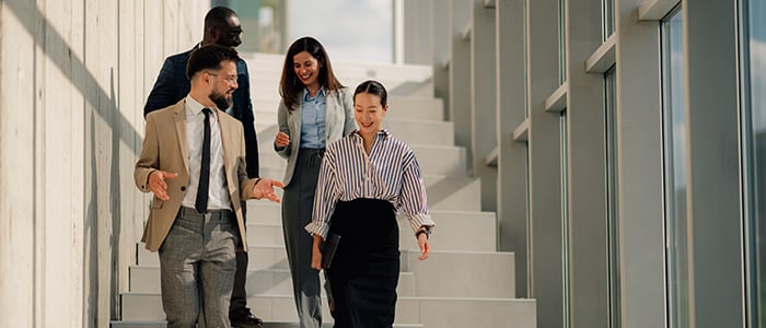 Team holds a debriefing during a walk