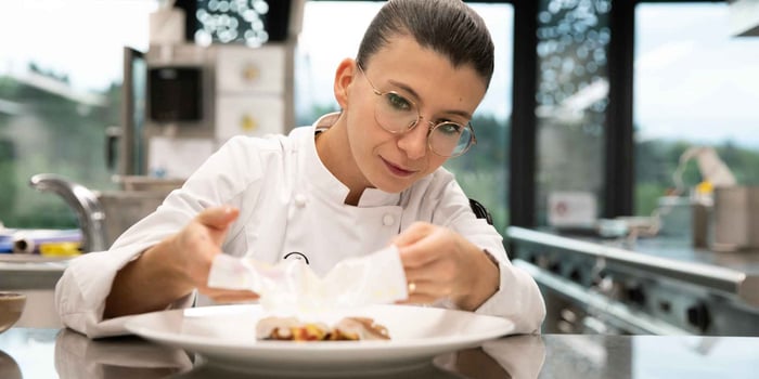 Chef Lucrèce Lacchio in the kitchen at Le Berceau des Sens at EHL Lausanne