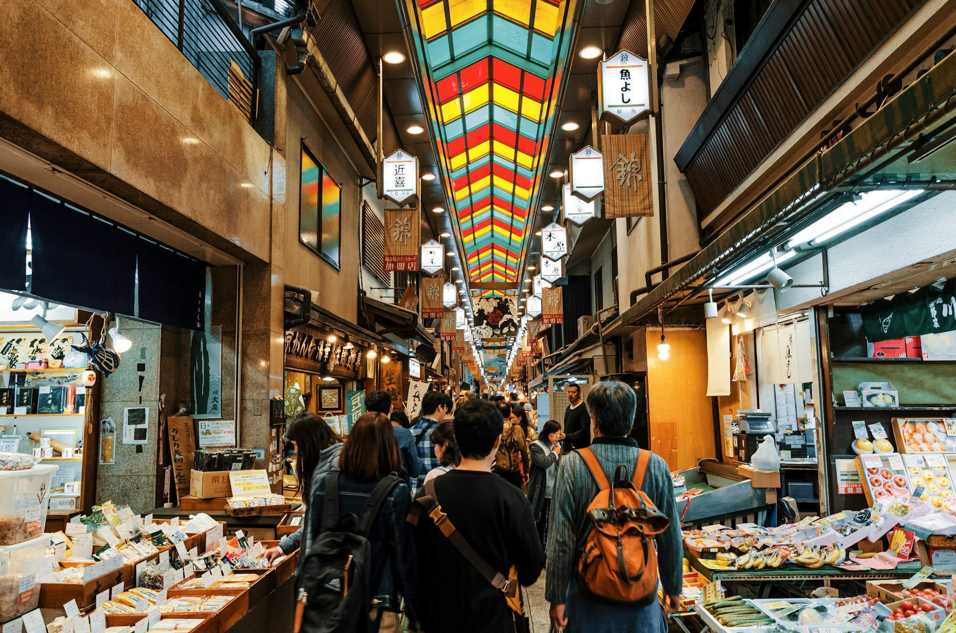 A lane full of restaurants and markets in Asia