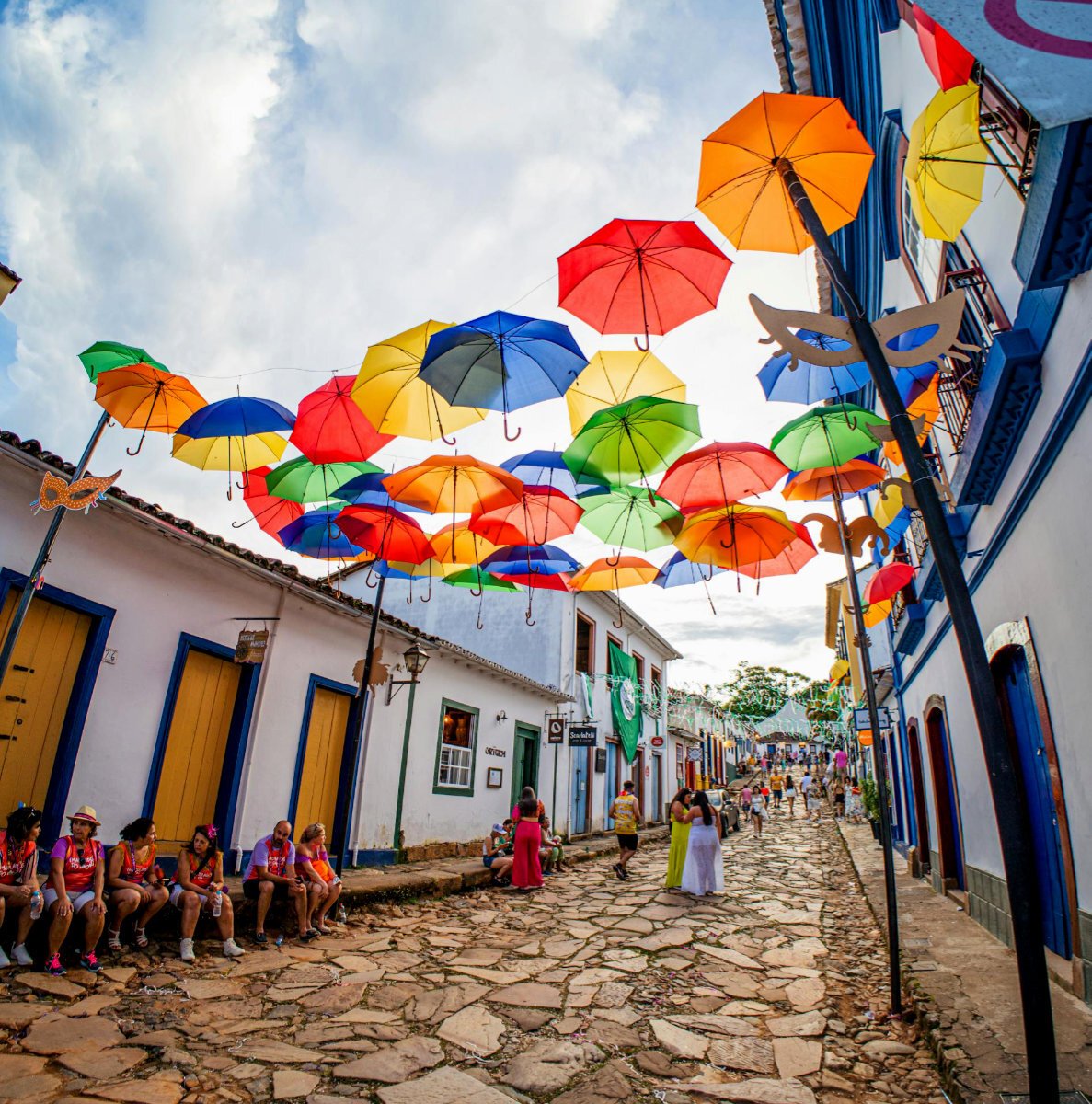 Colorful umbrellas on a cobbled street
