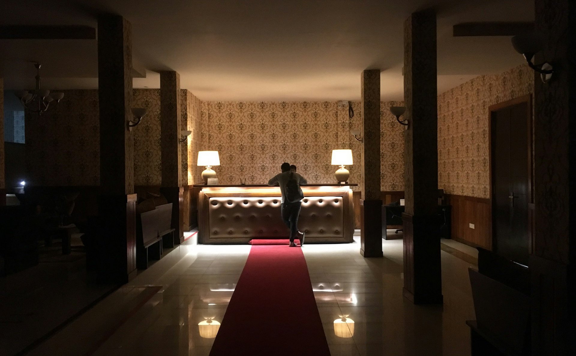 A guest checking in at reception