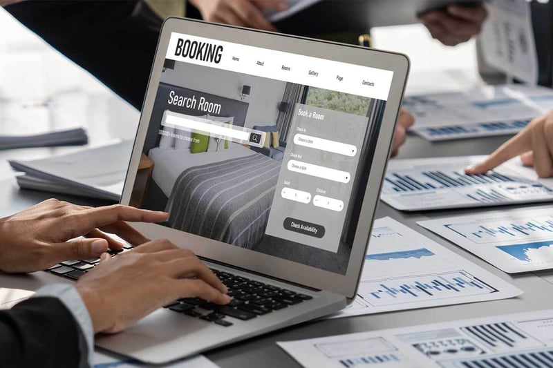 Laptop displaying a hotel booking page