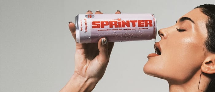 Kylie Jenner sipping from a can of Sprinter