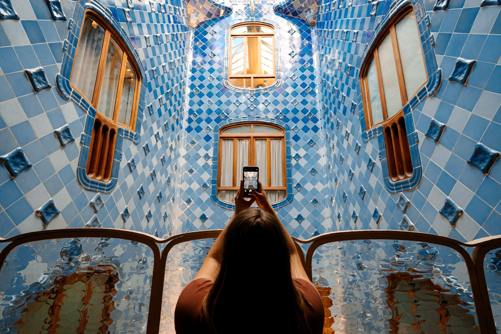 A travel influencer photographing architecture