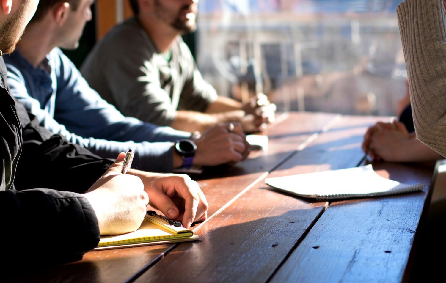 people-sitting-around-a-table