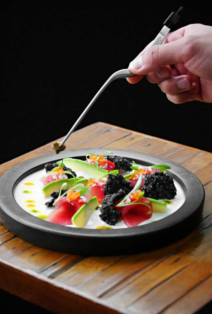 Plating a meal with tweezers