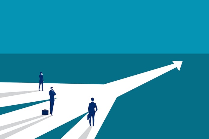 three people standing in front of one way