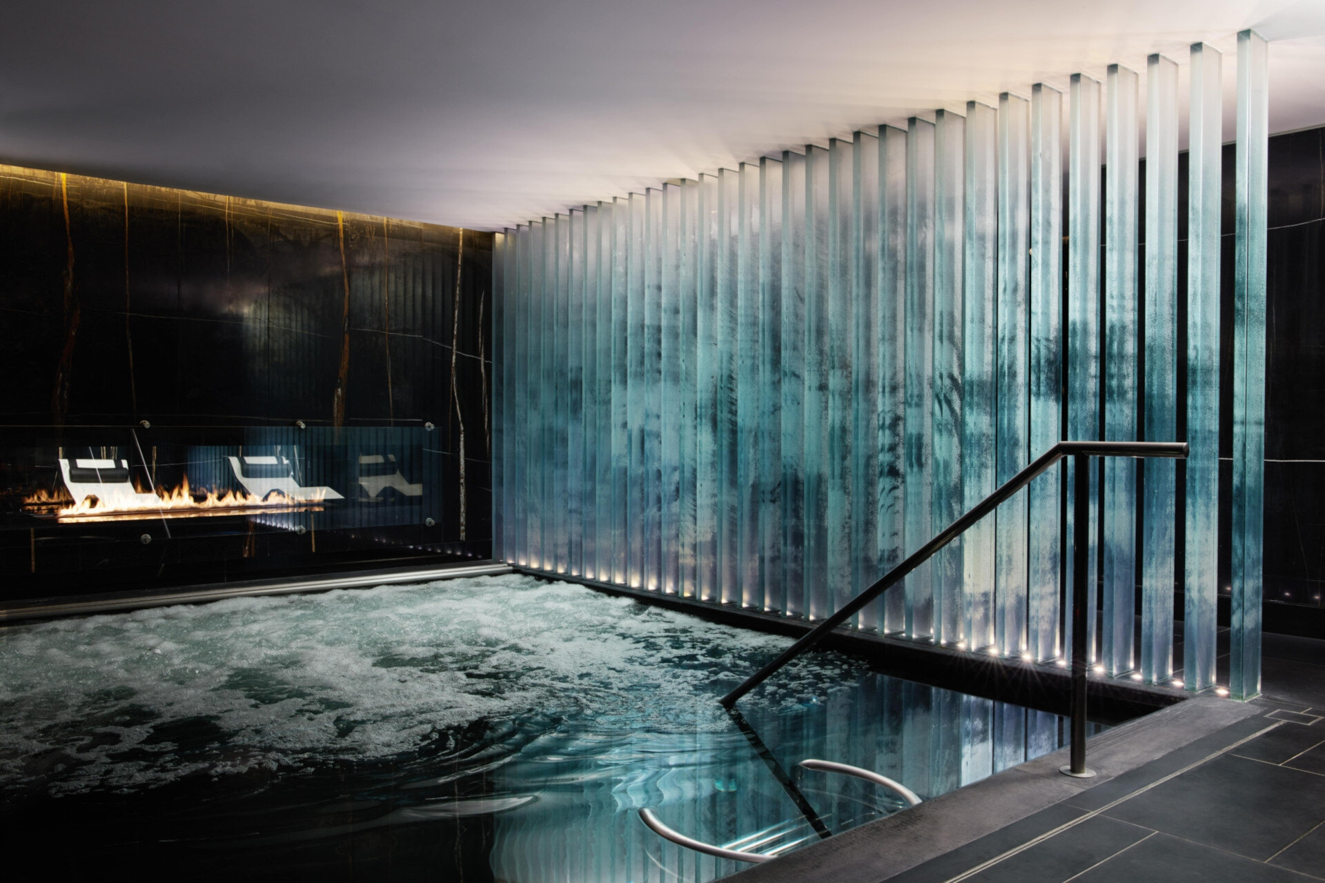 Corinthia London's spa pool lighting relaxes guests while giving staff visibility.