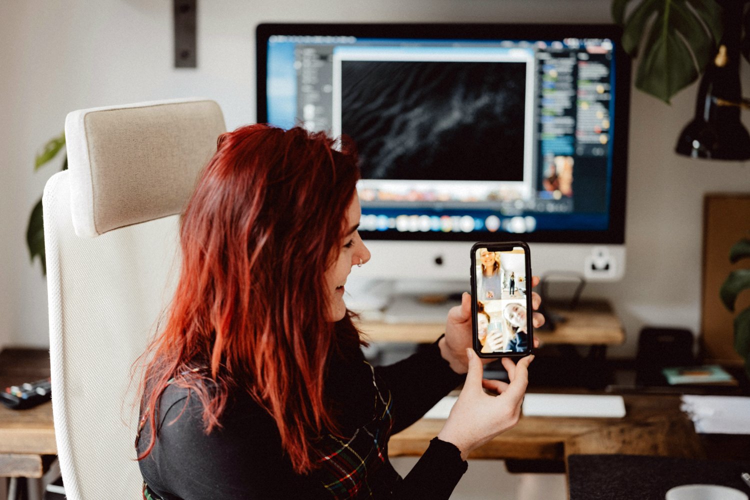 Person conducting a virtual meeting via phone