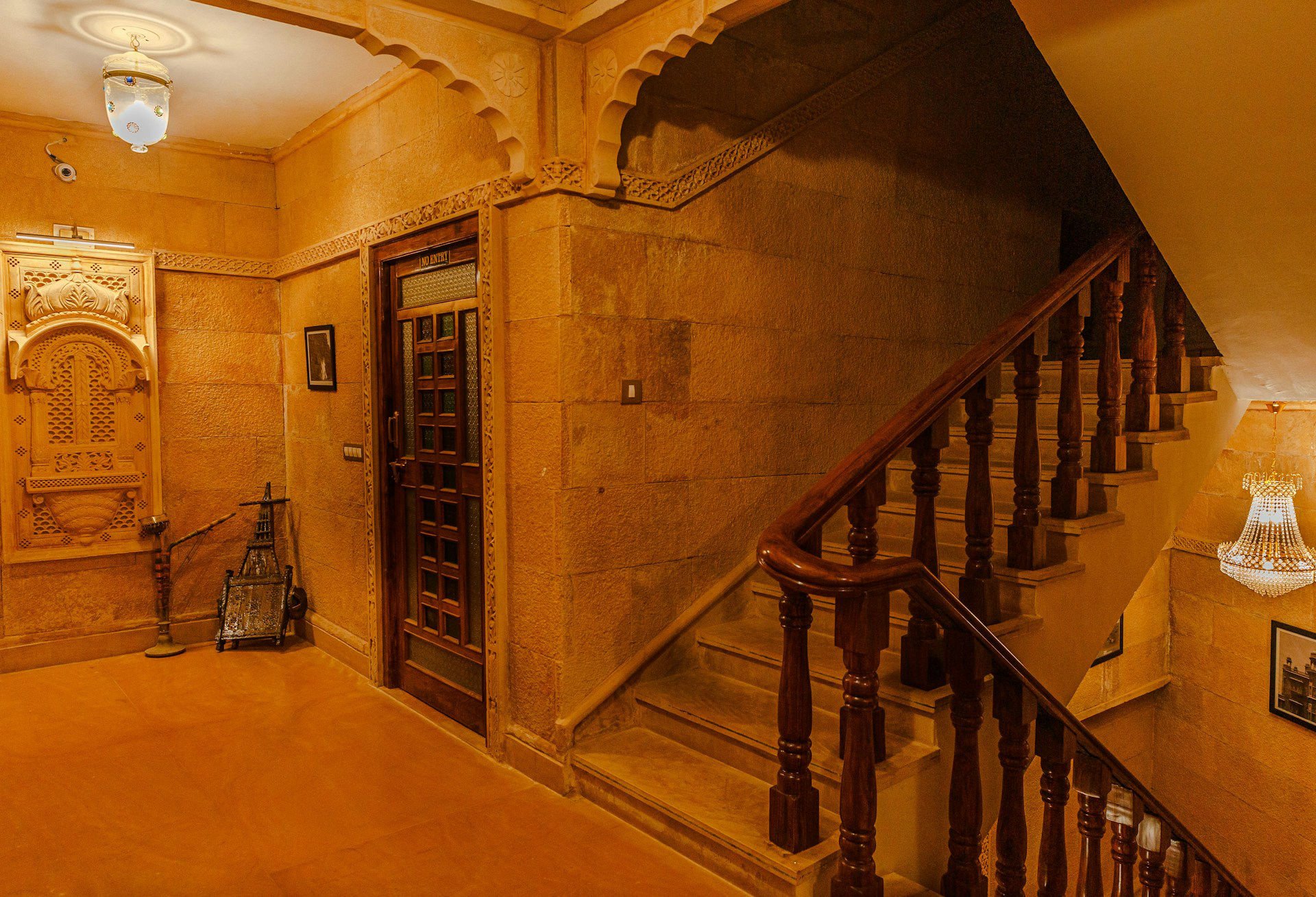 Warmly lit common space in a hotel