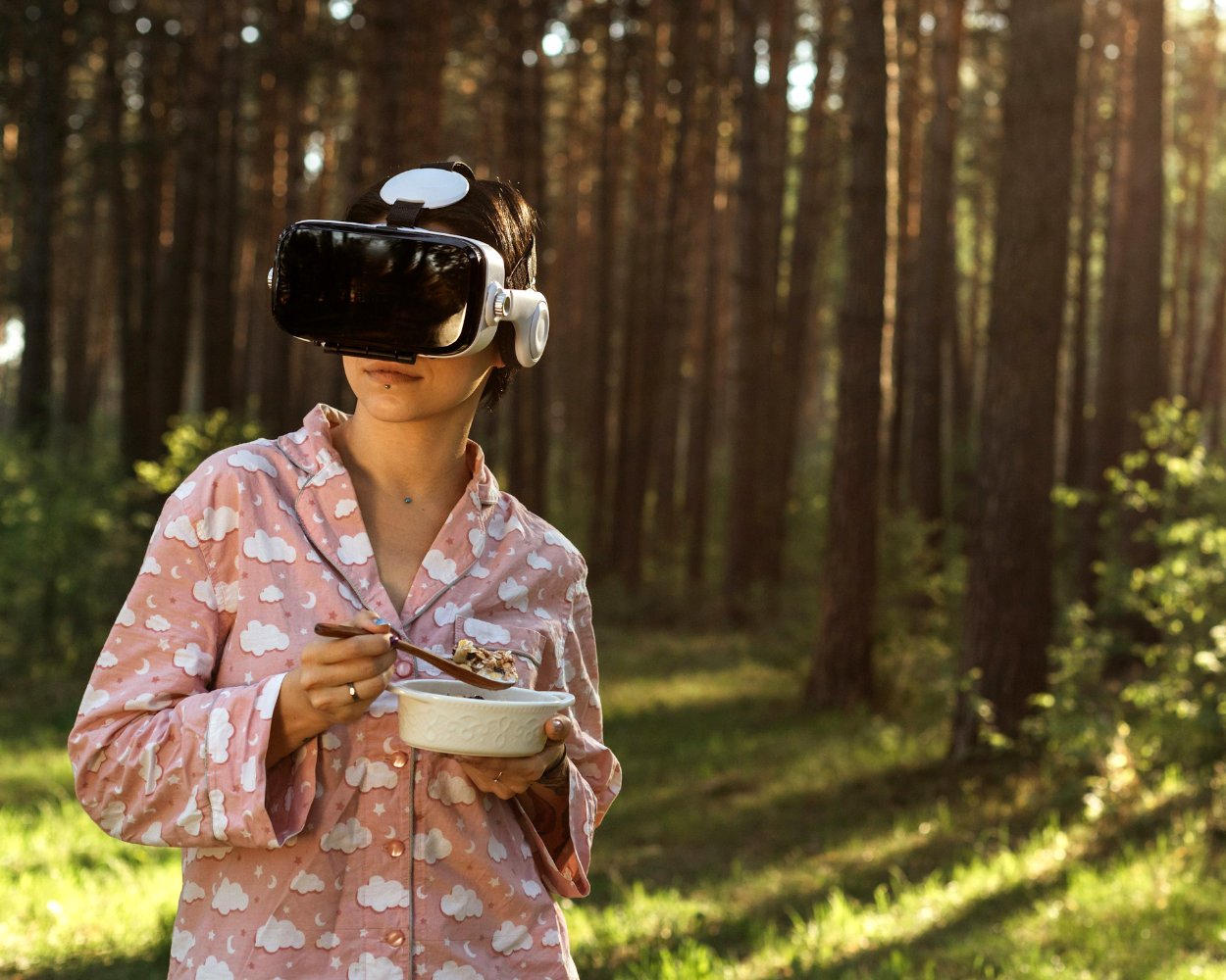 Person experiencing a forest in virtual reality