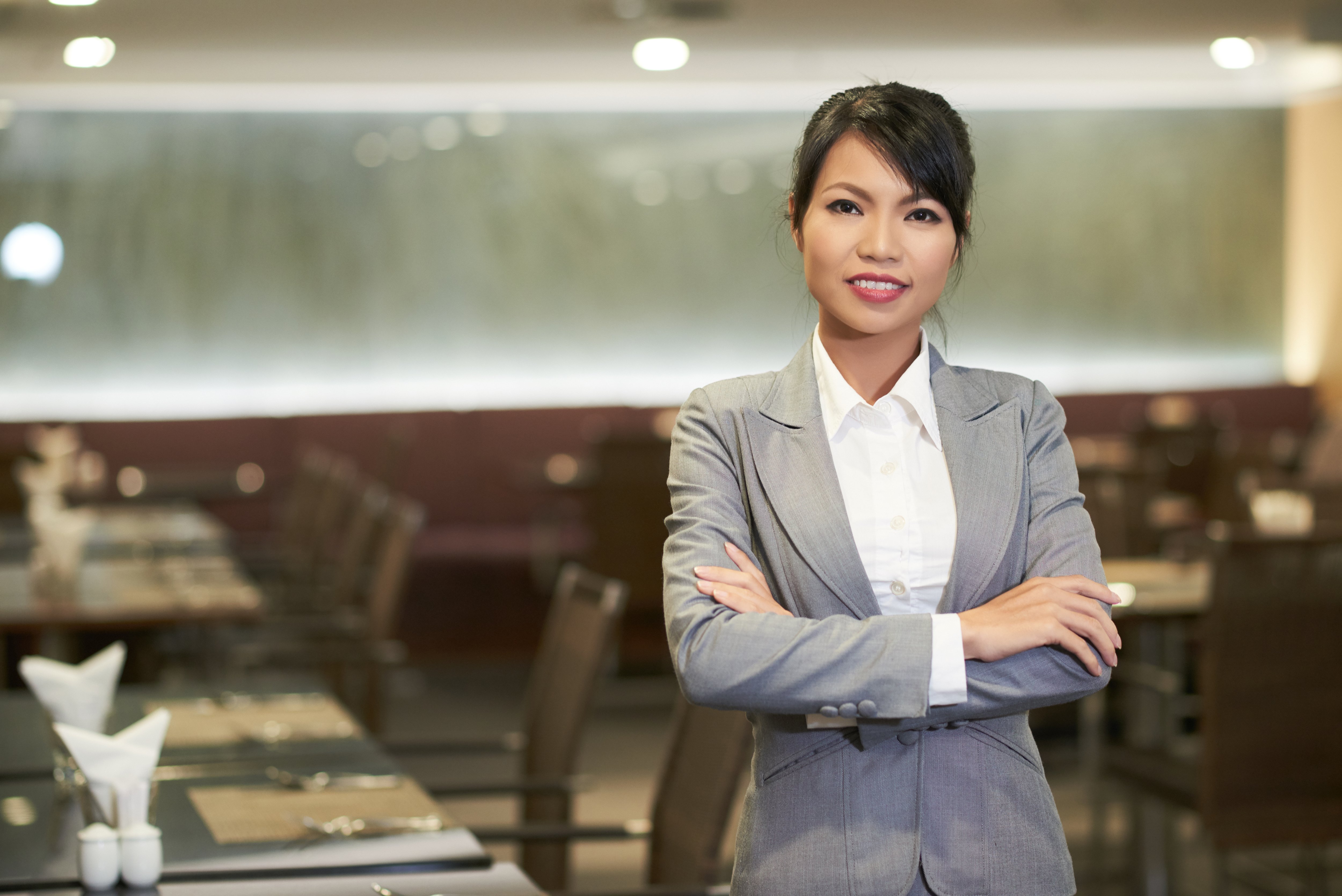 Hotel manager standing in a restaurant