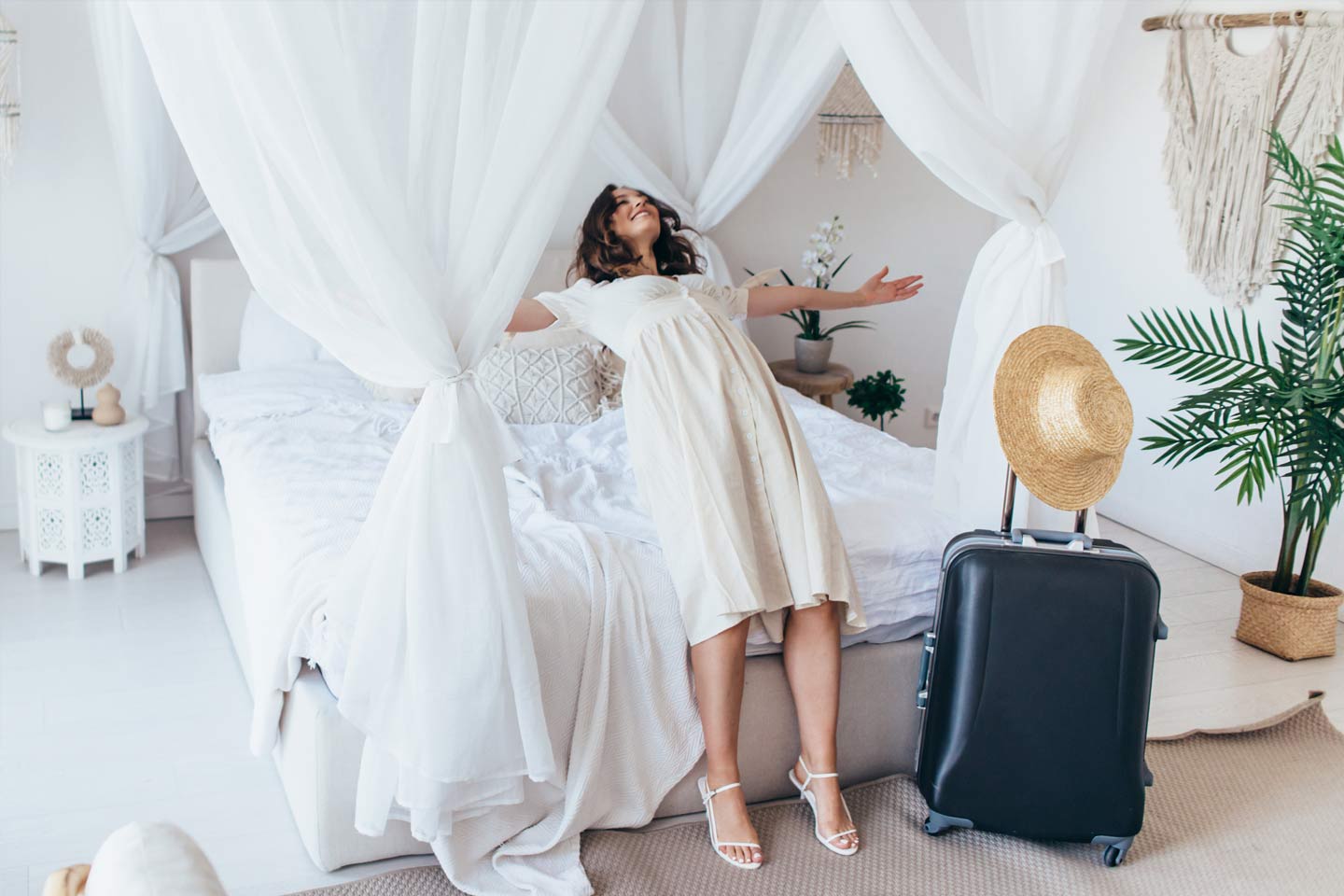hotel guest gracefully falling onto the bed