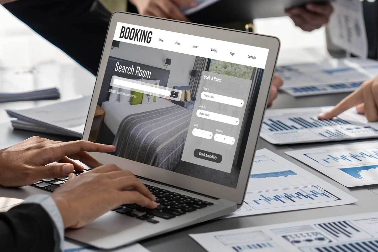Laptop displaying a hotel booking page